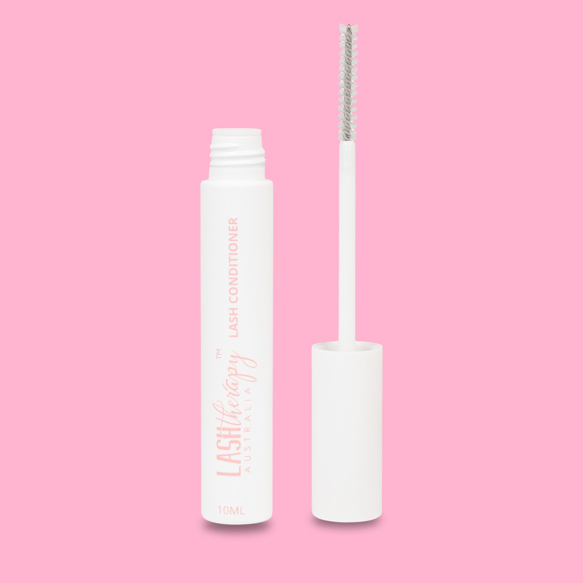 Lash Therapy Australia Lash Conditioner bottle with applicator wand on pink background