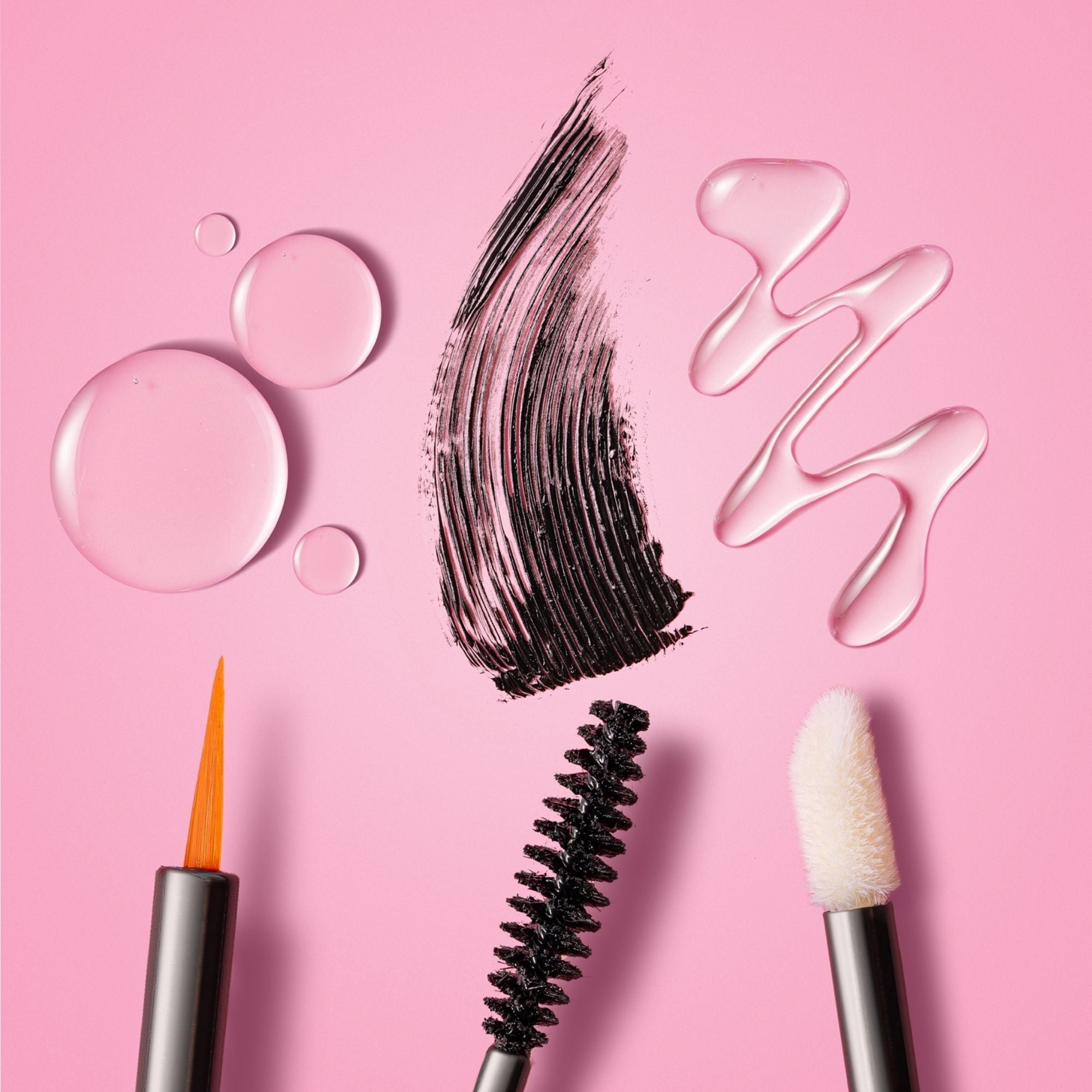 Lash Therapy Australia lash growth serum, brow growth serum and growth serum mascara applicators with product textures on pink background.