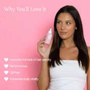 Model holding Lash Therapy Hair Boosting Peptide Serum for thicker, healthier hair